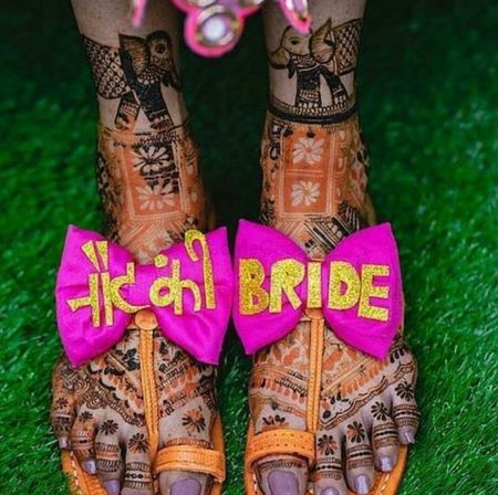 A bride flaunting her quirky footwear on her mehndi 