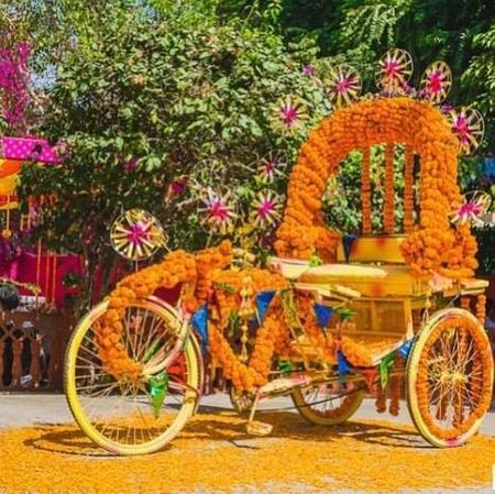 Photo of Floral rikshaw for mehendi decor