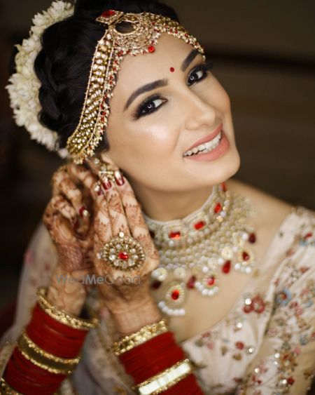 Bride getting ready shot with subtle makeup 