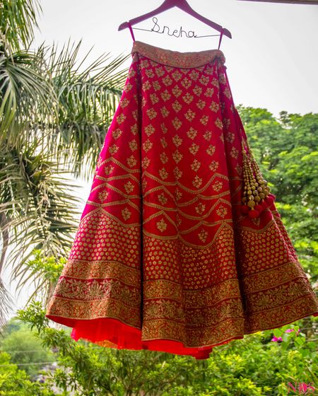 Bright Pink and Red Lehenga on Personalised Hanger