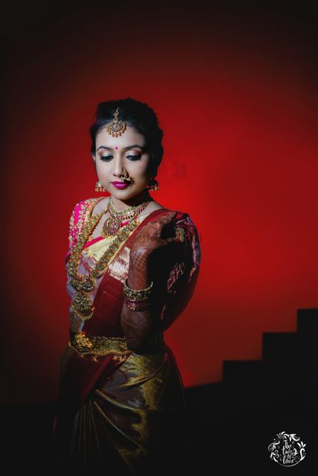 Photo of South indian bridal portrait in beige and red saree