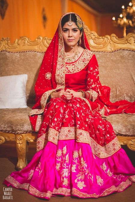 Photo of Red and pink bridal lehenga with kurta