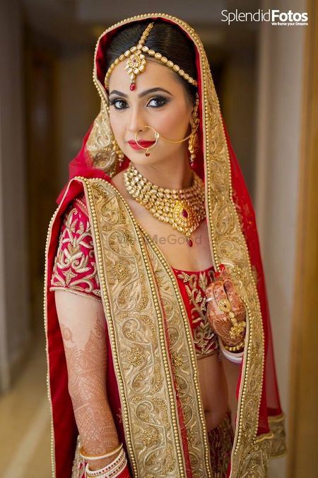Photo of Gold Kundan Bridal Jewellery with Red Stones
