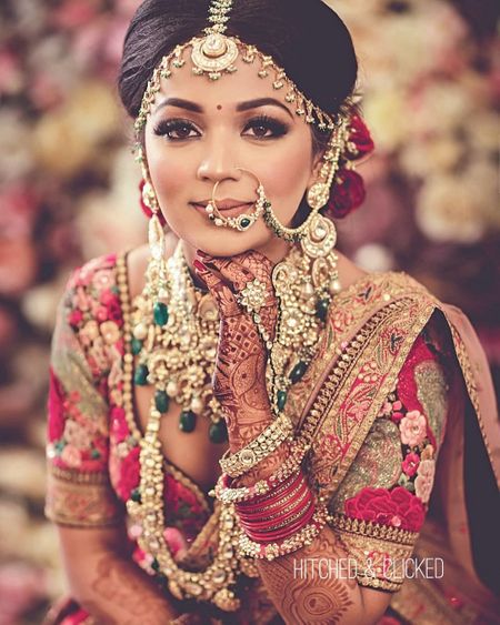 layered bridal jewellery with bridal nath and rani haar