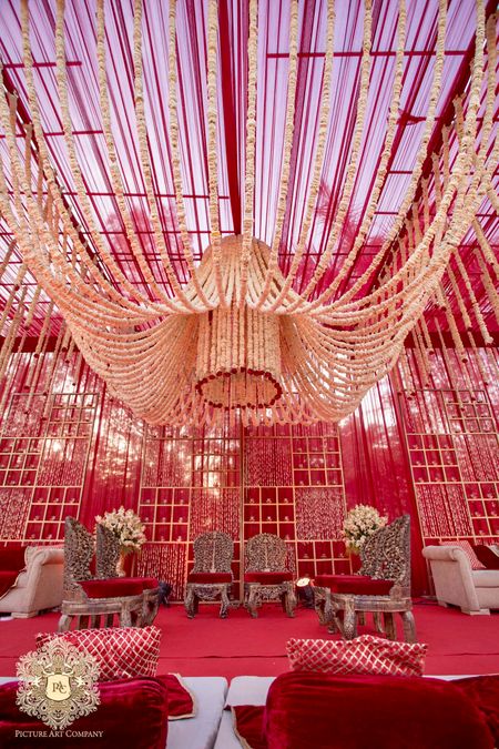 Photo of Mandap with floral chandelier