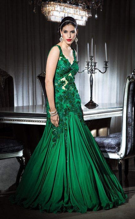 Photo of emerald green gown with sequin embroidery