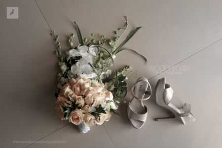 A unique bridal bouquet and a stunning pair of bridal shoes.
