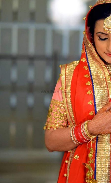Photo of Light Pink and Orange Bridal Outfit with Gotapatti Work