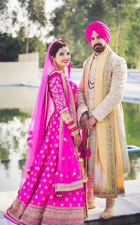Sikh Bride in Pink Bridal Anarkali with Gold Motifs