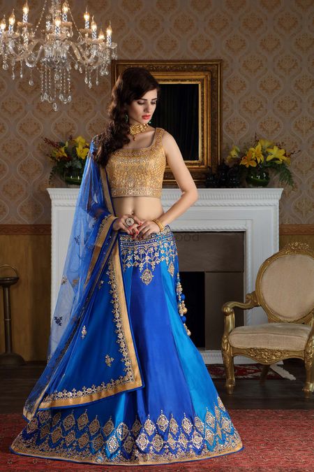 Photo of Royal Blue and Light Lehenga with Gold Sequin Blouse