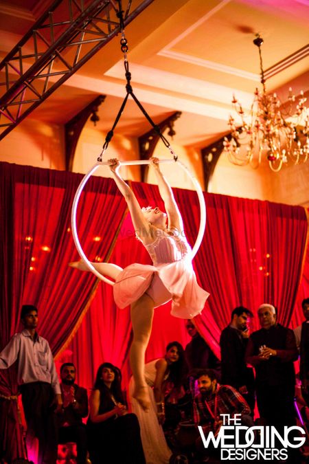 Photo of trapeze artist at cocktail