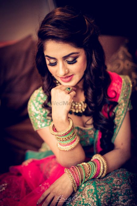Engagement bridal look with green and pink lehenga