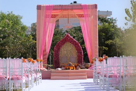 Outdoor morning sikh wedding decor with pink drapes