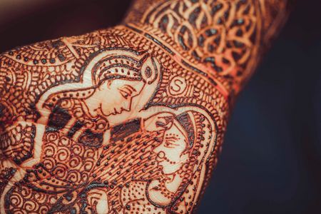 Photo of Bridal Mehendi Close Up with Bride and Groom Portrait