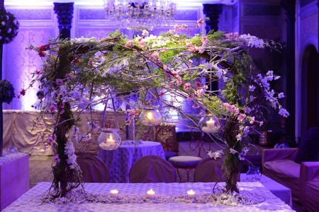 Photo of Lavender and green table centerpiece