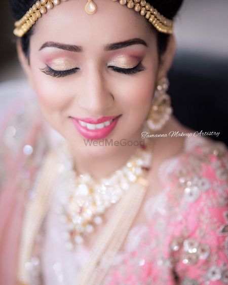 Pink and gold wedding makeup for Indian brides