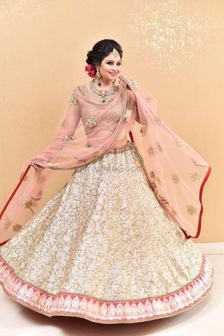 Light Pink Lehenga with Sequins all over and Red Border