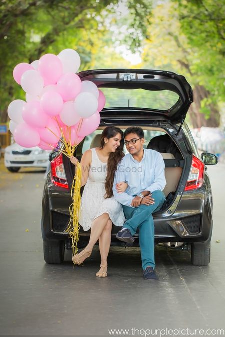 Photo of Pre wedding shoot in the car trunk
