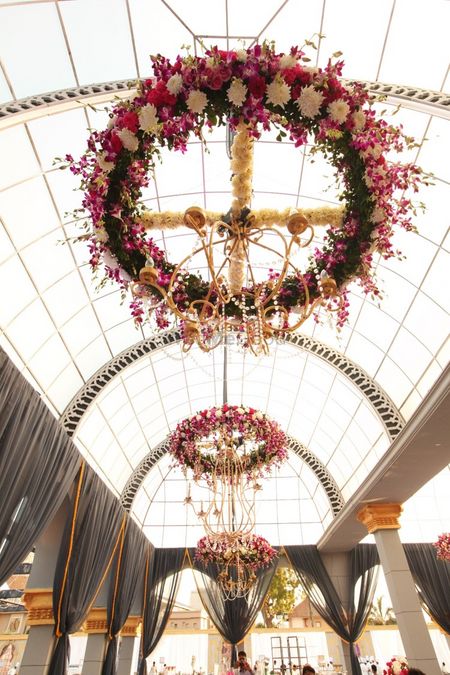 Photo of Suspended floral chandelier with pink and white flowers