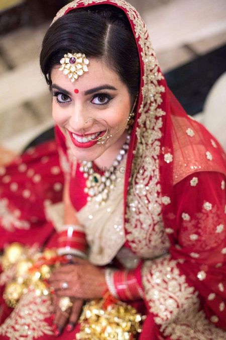 Red and dull gold bridal look
