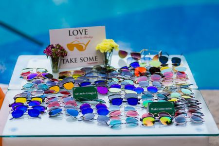 Photo of Sunglasses as favours for poolside mehendi