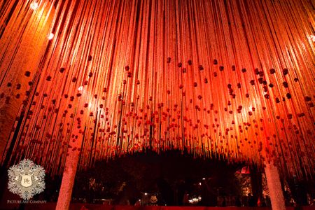 Mandap decor with hanging floral strings