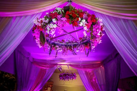 Floral chandelier with red and pink flowers
