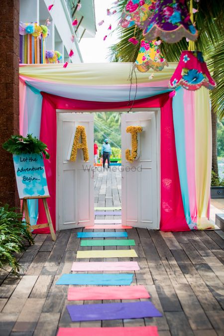 Colourful entrance decor with door and monograms