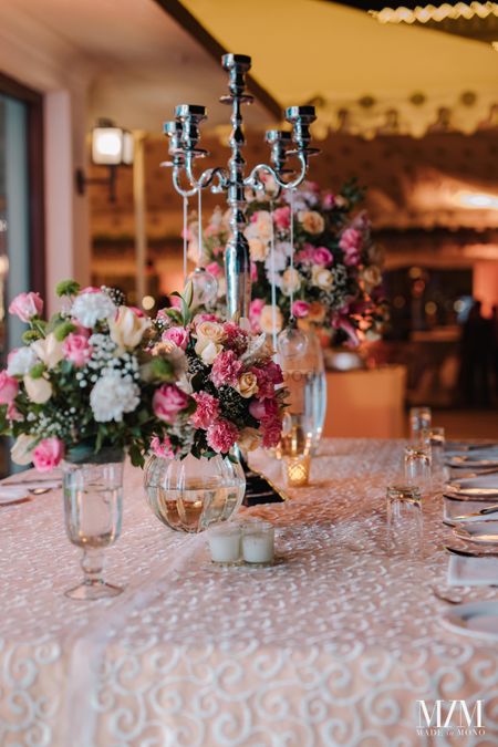 Photo of elegant floral centrepiece idea for wedding or cocktail