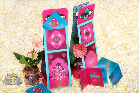 Bright pink and aqua card in card wedding invite