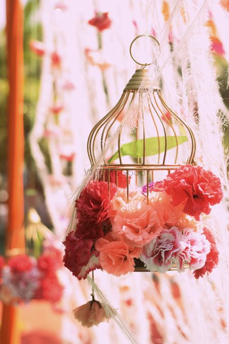 Photo of hanging floral bird cage