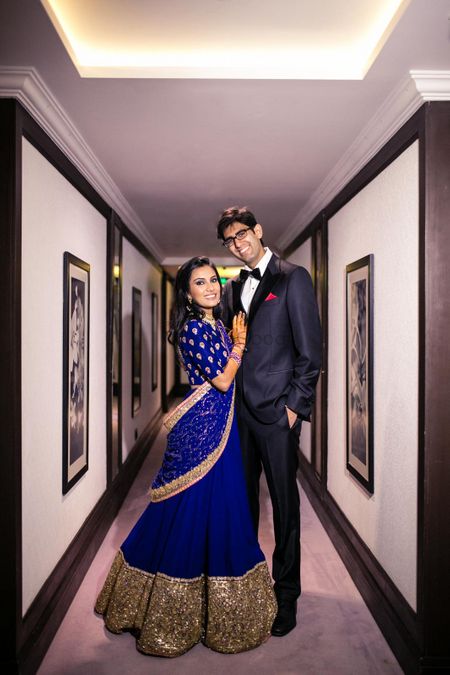 Royal blue lehenga with gold sequin work for reception