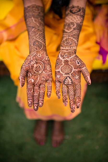 Mehendi design with musical instruments