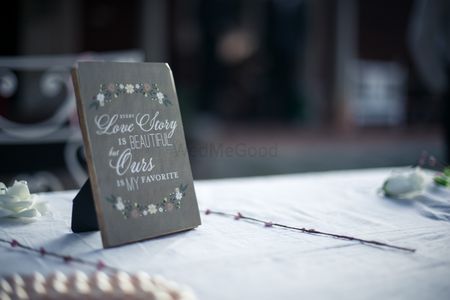 Frame on table top with cute saying