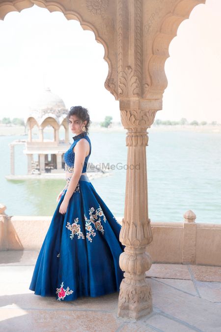 Photo of Cobalt blue gown with floral motifs