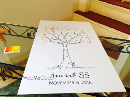 Photo of Unique idea for guests to leave imprint on paper tree