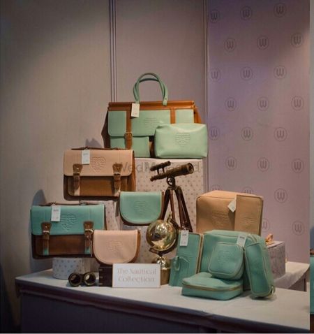 Photo of mint and beige luggage