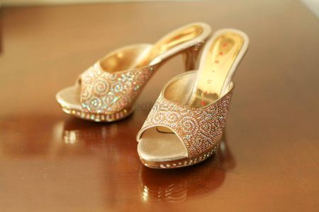 Photo of Bridal shoes with stone work in gold