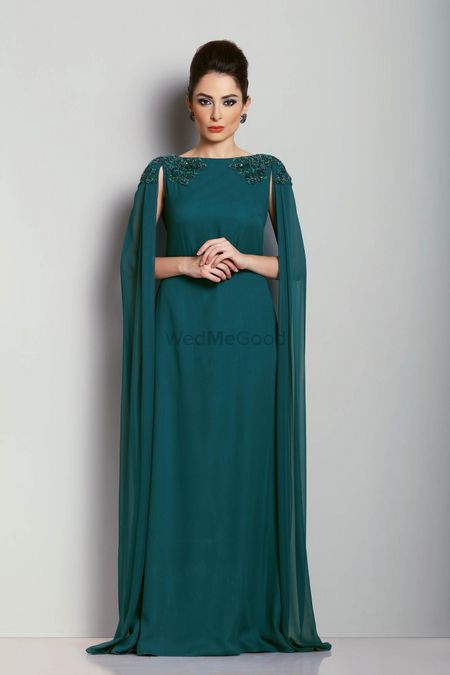 Teal evening gown with shoulder embroidered cape