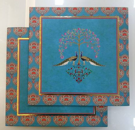 Simple blue wedding card with peacock motif