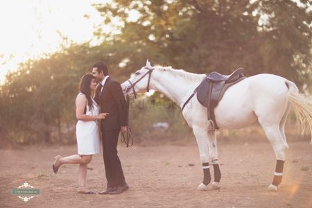 Photo of cute couple pre-wedding shoot with horse