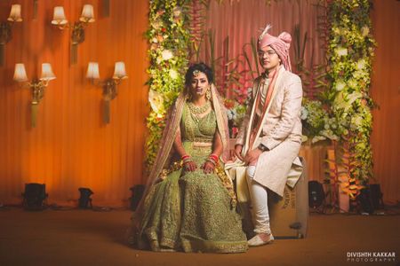 Contrasting bride and groom outfits in post wedding shoot