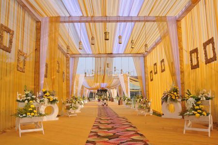 Photo of hanging lanterns and wooden frames entrance decor