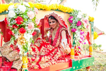 floral decorated palki bride entry