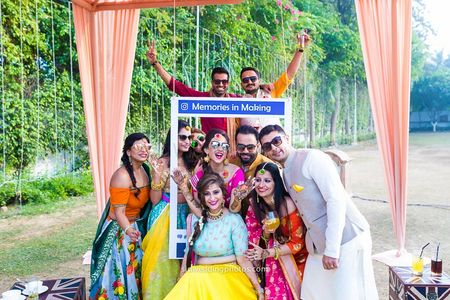 Photo of Backyard mehendi with bride and her friends with facebook photobooth