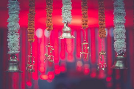 Hanging floral strings with temple bells and kaleere