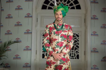 White red and green floral print sherwani with green safa