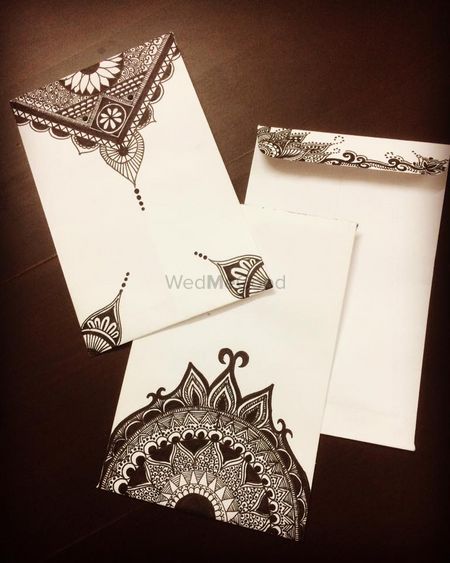 Photo of Black and white mandala wedding card