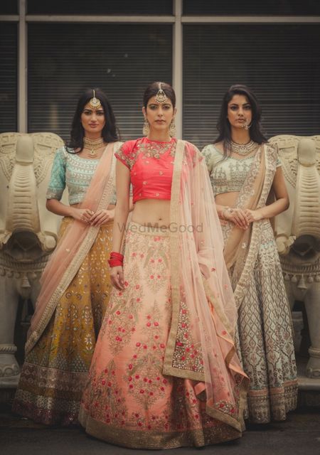 Photo of Coral and pink lehenga for engagement