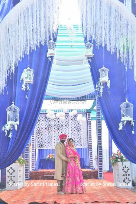 white and blue drapes stage decor